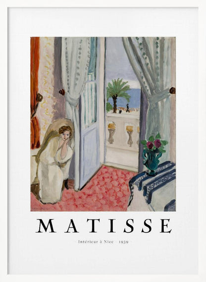A framed art print of Henri Matisse's painting 'Intérieur à Nice - 1939'. The painting depicts a woman in a white robe sitting in a sunlit room with an open door leading to a balcony overlooking the sea and a palm tree. The poster has a white border with the artist's name and the title below the artwork. Artwork