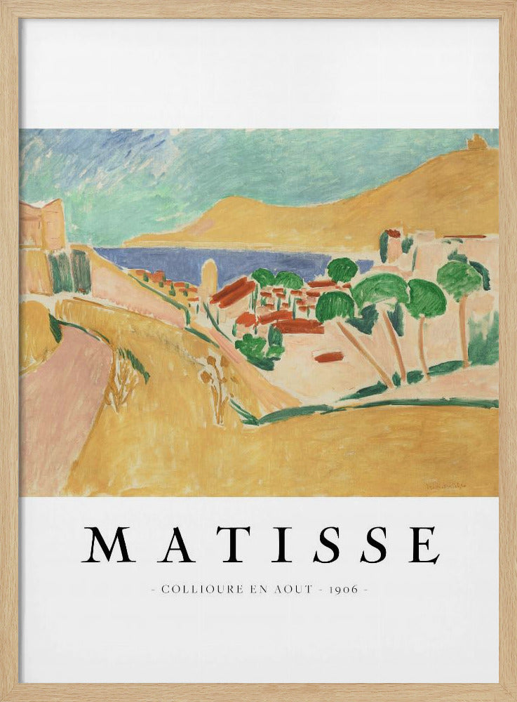 A poster featuring Henri Matisse's 1906 painting, 'Collioure en Aout'. The Fauvist artwork depicts a vibrant coastal landscape with yellow hills, a seaside village with red roofs, green trees, and a blue and turquoise sea. The poster has a black frame and white border with the artist's name and title underneath. Artwork