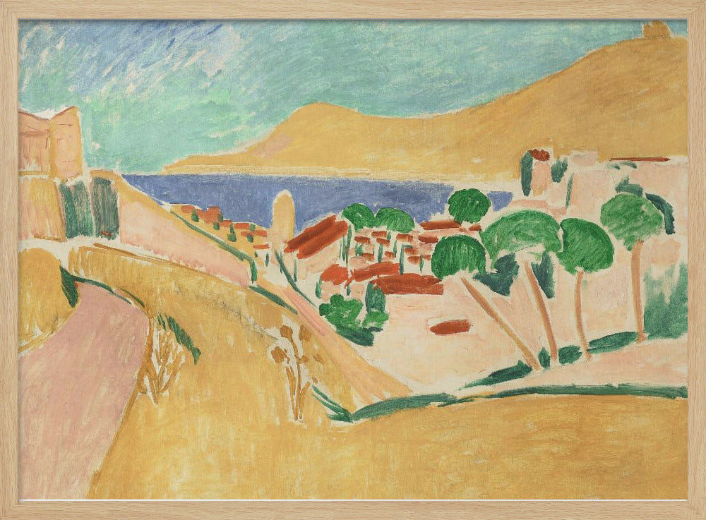 A Fauvist-style painting of a sunny coastal town, enclosed in a silver frame. The scene features warm yellow and pink hills, a village with red-roofed buildings and vibrant green trees, set against a deep blue sea and a large golden hill under a light blue sky. Print