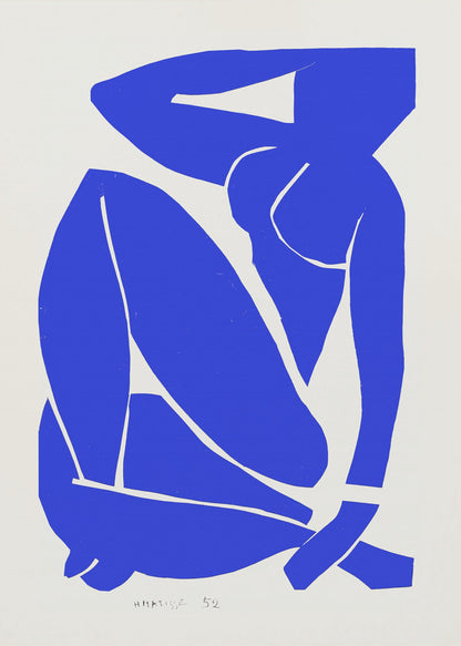 A framed print of Henri Matisse's 'Blue Nude II', featuring a bold, royal blue paper cutout of a seated female nude against an off-white background. The figure is stylized and abstract, with limbs folded and one arm behind her head. Print