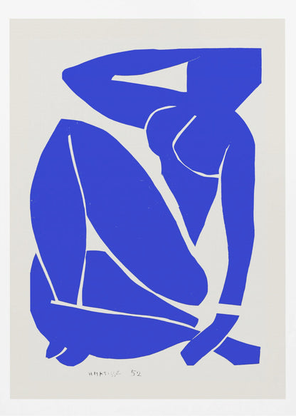 A framed print of Henri Matisse's 'Blue Nude II', featuring a bold, royal blue paper cutout of a seated female nude against an off-white background. The figure is stylized and abstract, with limbs folded and one arm behind her head. Print