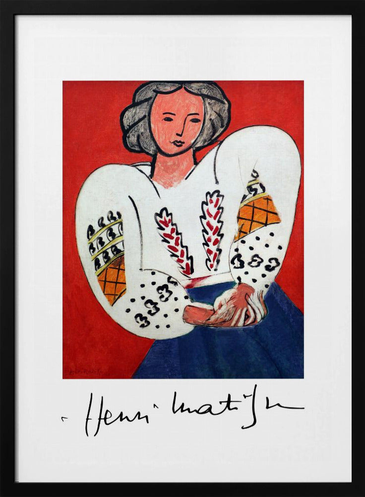 A framed art print of Henri Matisse's 'La Blouse Roumaine' (The Romanian Blouse). The painting depicts a woman with dark, styled hair against a vibrant solid red background. She is wearing a voluminous white blouse with puffy, intricately decorated sleeves and a dark blue skirt. Her hands are clasped in front of her. Below the image is the signature 'Henri Matisse'. Wall Art