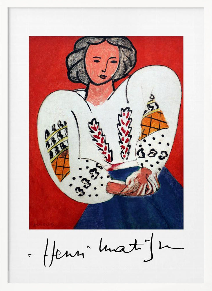 A framed art print of Henri Matisse's 'La Blouse Roumaine' (The Romanian Blouse). The painting depicts a woman with dark, styled hair against a vibrant solid red background. She is wearing a voluminous white blouse with puffy, intricately decorated sleeves and a dark blue skirt. Her hands are clasped in front of her. Below the image is the signature 'Henri Matisse'. Wall Art