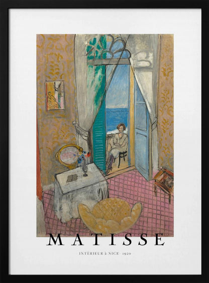 A poster of Henri Matisse's 1920 painting 'Intérieur à Nice'. The artwork depicts a room interior with an open door leading to a balcony where a woman sits overlooking the sea. The poster is in a black frame with 'MATISSE' written at the bottom. Print