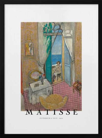 A poster of Henri Matisse's 1920 painting 'Intérieur à Nice'. The artwork depicts a room interior with an open door leading to a balcony where a woman sits overlooking the sea. The poster is in a black frame with 'MATISSE' written at the bottom. Print