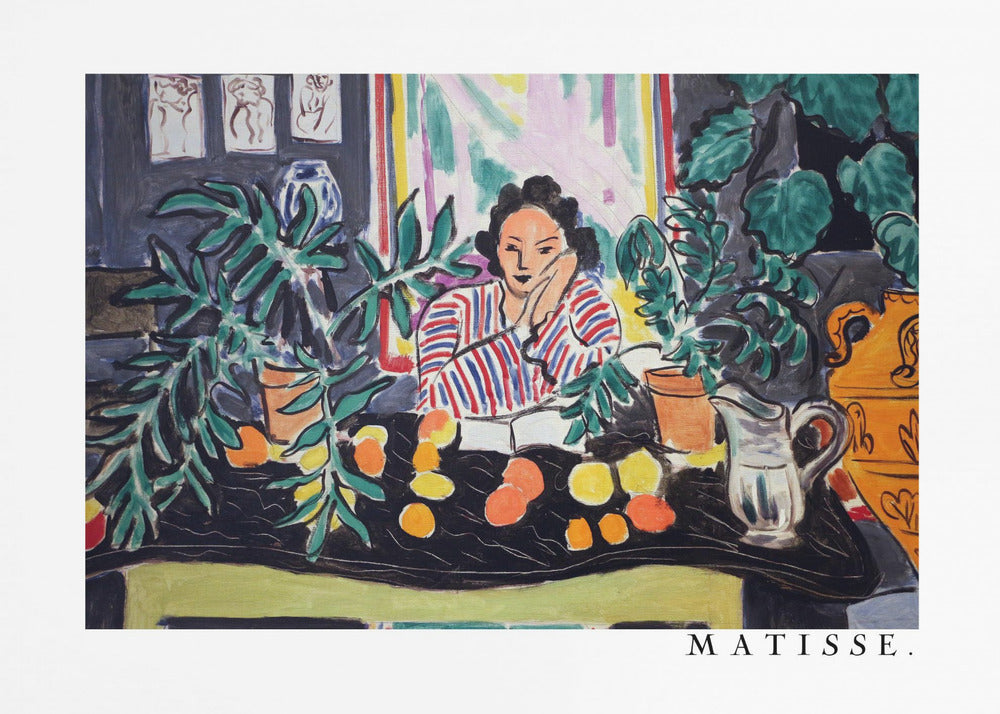 A framed print of the painting 'Woman with a Book' by Henri Matisse. The artwork features a woman in a red, white, and blue striped shirt sitting at a dark table filled with potted green plants and colorful fruit. She rests her head on her hand, looking out from the painting in a Fauvist style with bold colors and expressive brushwork. Poster
