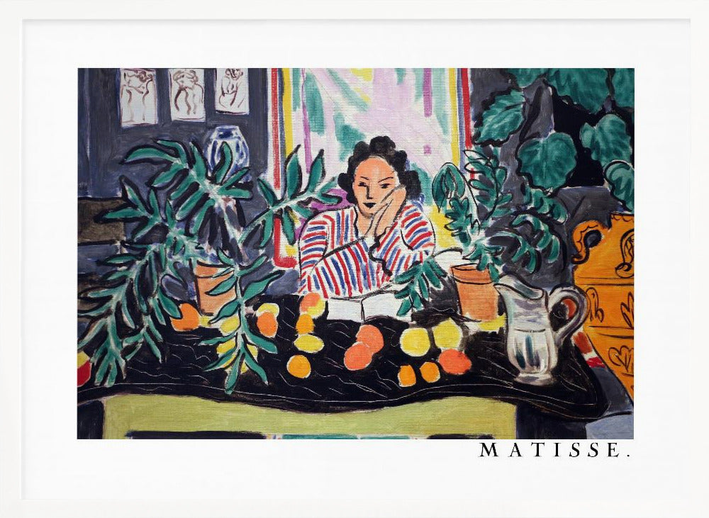 A framed print of the painting 'Woman with a Book' by Henri Matisse. The artwork features a woman in a red, white, and blue striped shirt sitting at a dark table filled with potted green plants and colorful fruit. She rests her head on her hand, looking out from the painting in a Fauvist style with bold colors and expressive brushwork. Poster