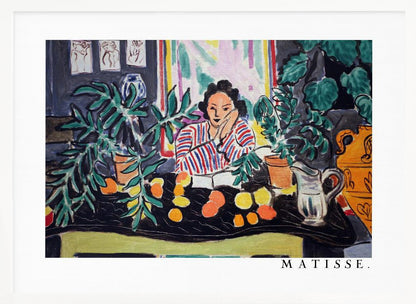 A framed print of the painting 'Woman with a Book' by Henri Matisse. The artwork features a woman in a red, white, and blue striped shirt sitting at a dark table filled with potted green plants and colorful fruit. She rests her head on her hand, looking out from the painting in a Fauvist style with bold colors and expressive brushwork. Poster