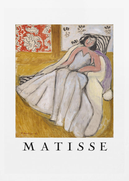 An art print poster of a Henri Matisse painting. The image features a woman with dark hair wearing a long, light-colored dress, reclining in a golden-yellow armchair. The background includes a red and white floral pattern and other decorative elements. The word 'MATISSE' is printed in large black letters below the artwork, all enclosed in a black frame. Decor