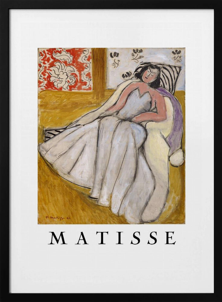 An art print poster of a Henri Matisse painting. The image features a woman with dark hair wearing a long, light-colored dress, reclining in a golden-yellow armchair. The background includes a red and white floral pattern and other decorative elements. The word 'MATISSE' is printed in large black letters below the artwork, all enclosed in a black frame. Decor