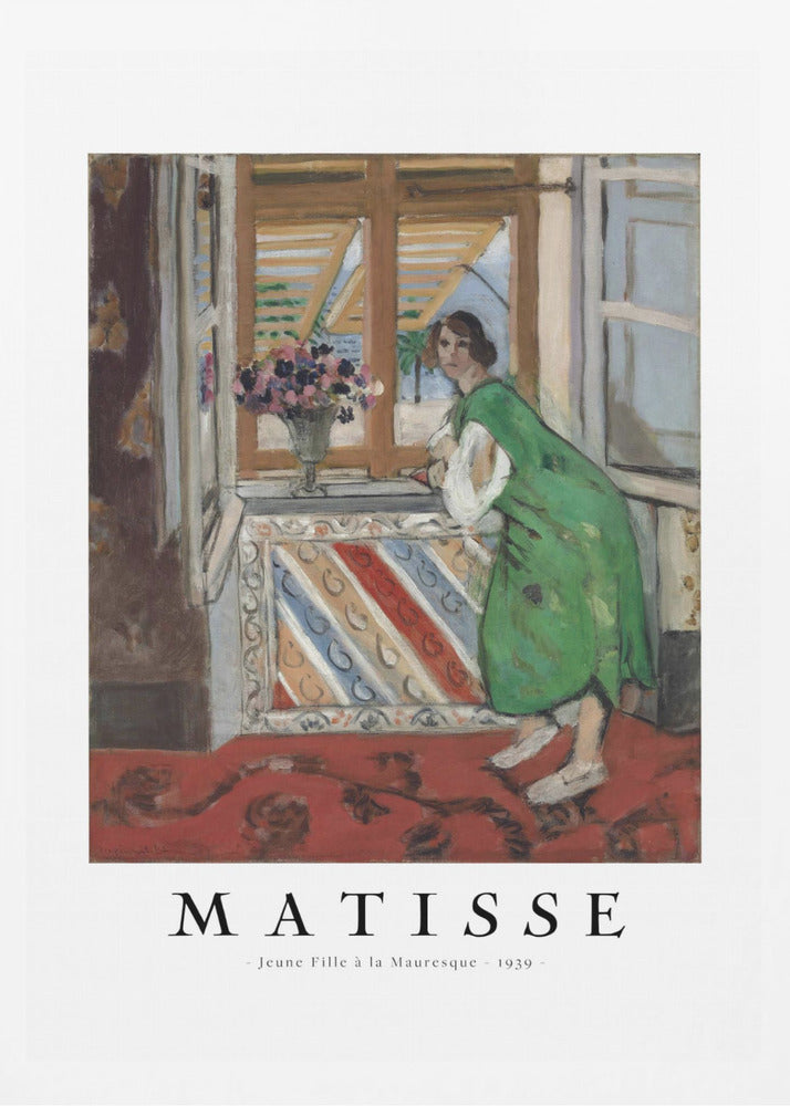 A framed art print of Henri Matisse's painting 'Jeune Fille à la Mauresque - 1939'. The painting shows a woman in a vibrant green dress standing in a room and looking out of an open window with shutters. A red patterned rug covers the floor, and a vase of flowers sits on the windowsill. Poster