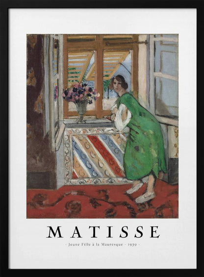 A framed art print of Henri Matisse's painting 'Jeune Fille à la Mauresque - 1939'. The painting shows a woman in a vibrant green dress standing in a room and looking out of an open window with shutters. A red patterned rug covers the floor, and a vase of flowers sits on the windowsill. Poster