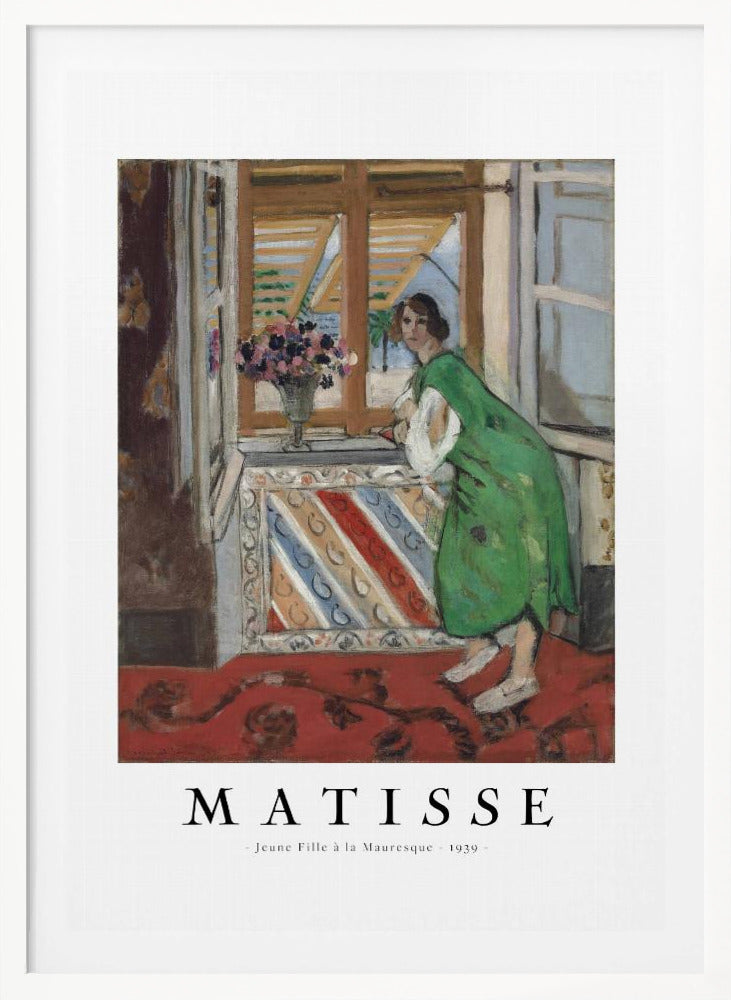 A framed art print of Henri Matisse's painting 'Jeune Fille à la Mauresque - 1939'. The painting shows a woman in a vibrant green dress standing in a room and looking out of an open window with shutters. A red patterned rug covers the floor, and a vase of flowers sits on the windowsill. Poster