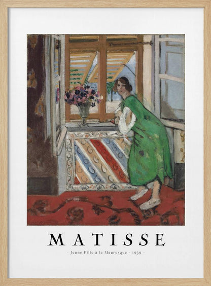 A framed art print of Henri Matisse's painting 'Jeune Fille à la Mauresque - 1939'. The painting shows a woman in a vibrant green dress standing in a room and looking out of an open window with shutters. A red patterned rug covers the floor, and a vase of flowers sits on the windowsill. Poster