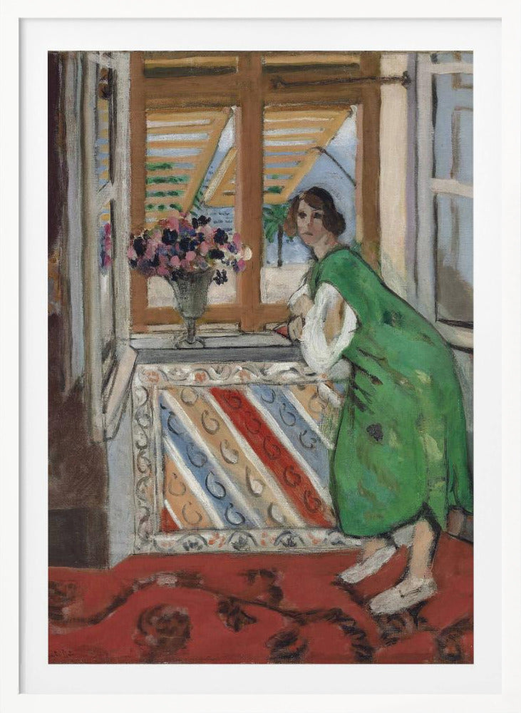 A painting by Henri Matisse depicting a woman in a loose green dress leaning on a windowsill and looking towards the viewer. Outside the open window with tan shutters, a sunny scene with a palm tree is visible. A vase of flowers sits on the sill above a colorful striped panel, and a red patterned rug covers the floor. Print
