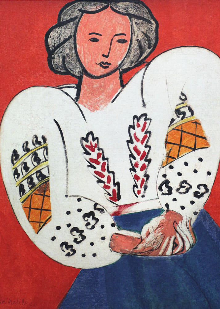 A colorful Fauvist painting by Henri Matisse depicting a woman with dark hair against a bold red background. She is wearing a traditional white Romanian blouse with voluminous, patterned sleeves and a blue skirt, with her hands clasped in her lap. Wall Art