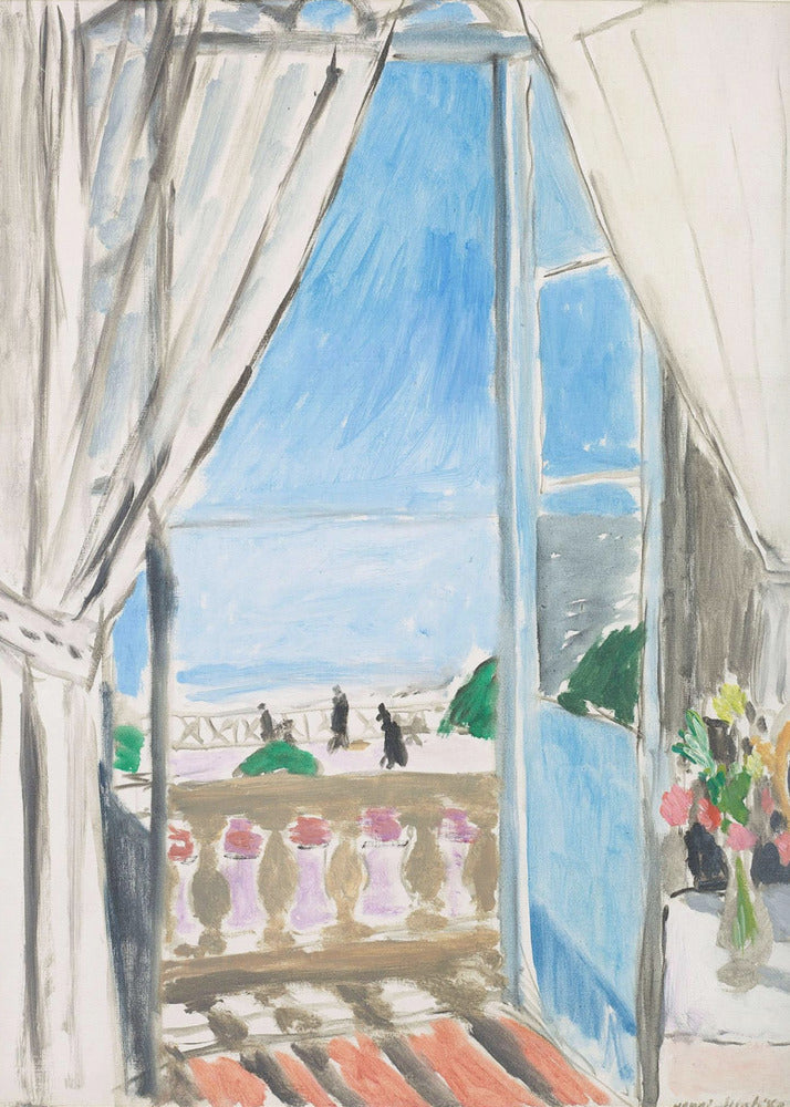 A Fauvist-style painting by Henri Matisse of a view from a window. The scene looks out from behind white curtains, over a balcony with a terracotta floor, to a bright blue sea and sky. Silhouettes of people walk along a promenade in the distance. To the right, a small vase of colorful flowers sits on a table. Decor
