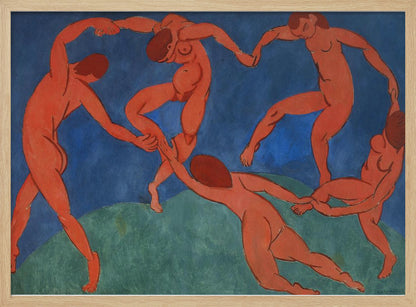 A framed print of Henri Matisse's painting 'The Dance,' featuring five nude, reddish-orange figures holding hands and dancing in a circle against a vibrant blue sky and a green hill. Decor