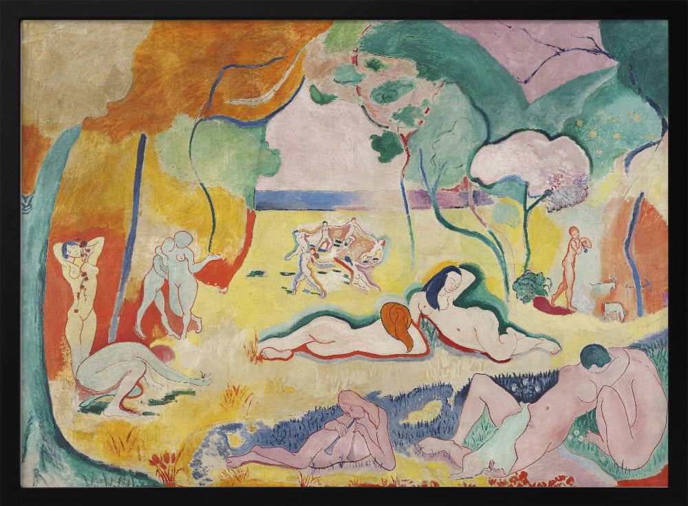 A framed print of Henri Matisse's Fauvist painting, 'Le bonheur de vivre' (The Joy of Life). It shows a vibrant, colorful landscape with numerous nude figures relaxing, dancing, and playing music. The scene uses unnaturalistic colors like yellow earth, orange and green trees, and a pink sky to evoke a sense of idyllic joy. Decor