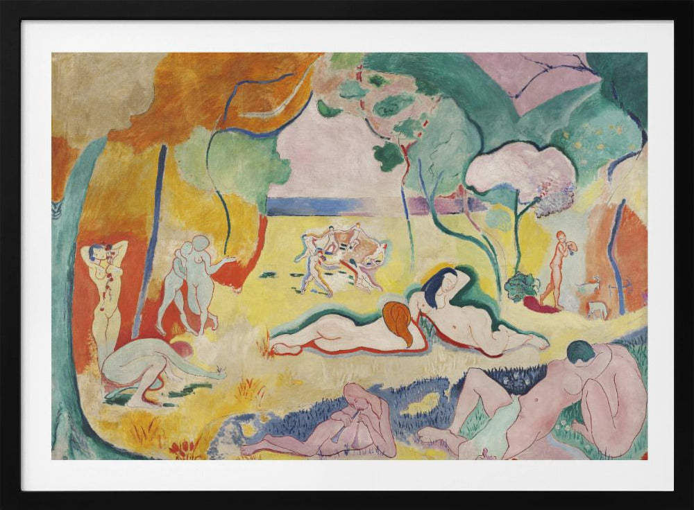 A framed print of Henri Matisse's Fauvist painting, 'Le bonheur de vivre' (The Joy of Life). It shows a vibrant, colorful landscape with numerous nude figures relaxing, dancing, and playing music. The scene uses unnaturalistic colors like yellow earth, orange and green trees, and a pink sky to evoke a sense of idyllic joy. Decor