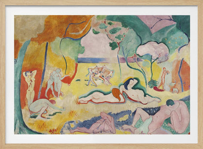A framed print of Henri Matisse's Fauvist painting, 'Le bonheur de vivre' (The Joy of Life). It shows a vibrant, colorful landscape with numerous nude figures relaxing, dancing, and playing music. The scene uses unnaturalistic colors like yellow earth, orange and green trees, and a pink sky to evoke a sense of idyllic joy. Decor