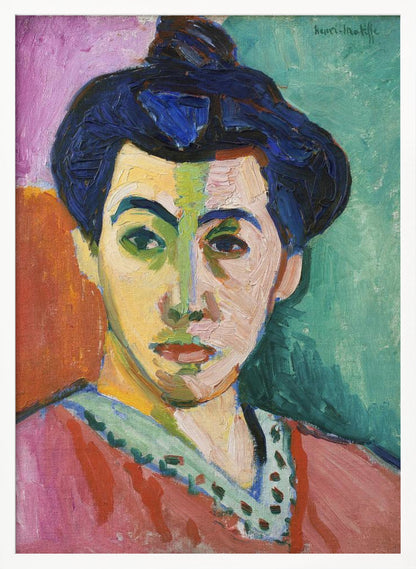 A Fauvist portrait painting by Henri Matisse, 'The Green Stripe,' featuring a woman with dark hair in an updo. Her face is strikingly rendered with unrealistic colors, bisected by a prominent green stripe. The background is composed of bold, flat planes of pink, orange, and teal. Print