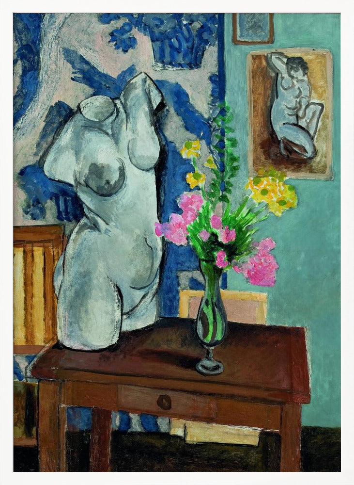 A colorful still life painting by Henri Matisse depicting a white plaster torso of a woman on a dark brown table next to a vase of bright pink and yellow flowers. The background features a blue and white patterned fabric and a light blue wall with a small framed nude drawing. Decor