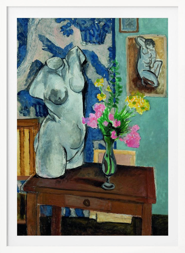 A colorful still life painting by Henri Matisse depicting a white plaster torso of a woman on a dark brown table next to a vase of bright pink and yellow flowers. The background features a blue and white patterned fabric and a light blue wall with a small framed nude drawing. Decor