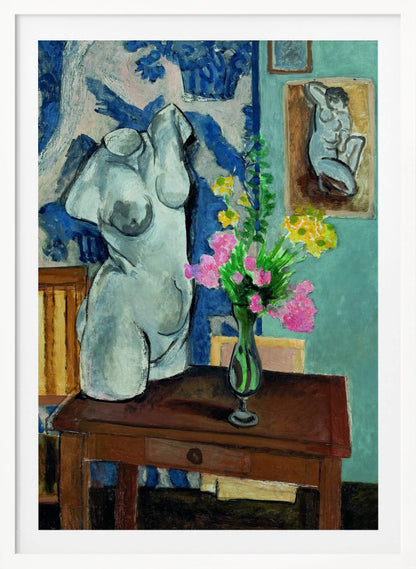 A colorful still life painting by Henri Matisse depicting a white plaster torso of a woman on a dark brown table next to a vase of bright pink and yellow flowers. The background features a blue and white patterned fabric and a light blue wall with a small framed nude drawing. Decor
