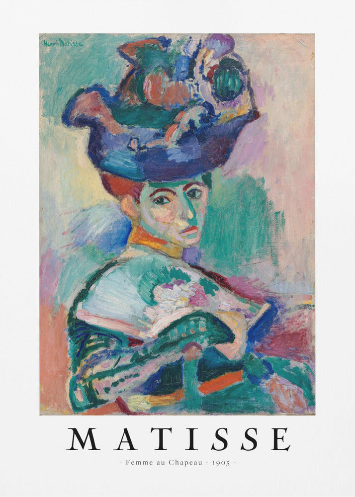 A framed art print of Henri Matisse's famous 1905 Fauvist painting, 'Femme au Chapeau' (Woman with a Hat). The portrait features a woman with an extravagantly decorated, colorful hat, painted with bold, non-naturalistic colors and expressive brushstrokes. Print