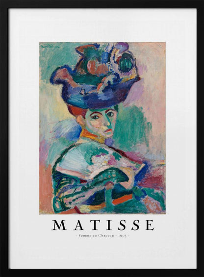 A framed art print of Henri Matisse's famous 1905 Fauvist painting, 'Femme au Chapeau' (Woman with a Hat). The portrait features a woman with an extravagantly decorated, colorful hat, painted with bold, non-naturalistic colors and expressive brushstrokes. Print