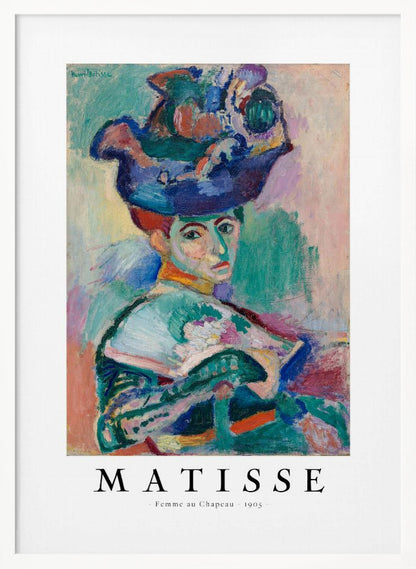 A framed art print of Henri Matisse's famous 1905 Fauvist painting, 'Femme au Chapeau' (Woman with a Hat). The portrait features a woman with an extravagantly decorated, colorful hat, painted with bold, non-naturalistic colors and expressive brushstrokes. Print