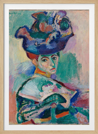A vibrant Fauvist portrait painting by Henri Matisse of a woman with red hair wearing an elaborate, colorful blue, purple, and green hat. The painting features bold, expressive brushstrokes and non-naturalistic colors, with a background of green, pink, and yellow hues. Wall Art
