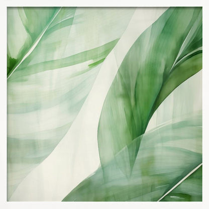 A light wood framed artwork depicting a close-up, abstract watercolor painting of large, overlapping tropical leaves. The shades of green are soft and translucent, creating a layered effect against a bright white background, evoking a sense of calm and nature. Print