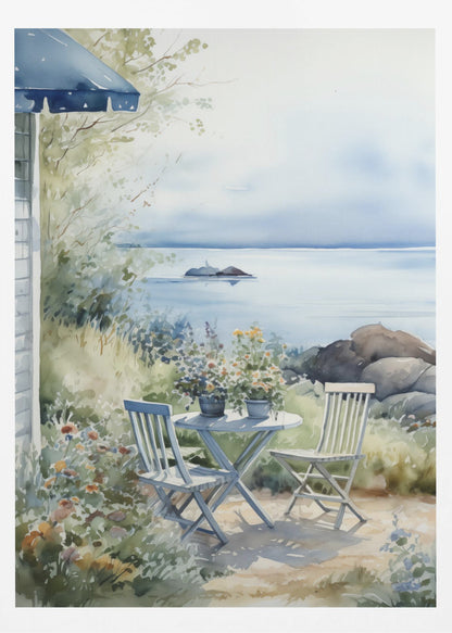 A watercolor painting of a tranquil coastal scene. A light blue bistro table and two matching chairs sit in a lush garden filled with flowers, overlooking a calm body of water. In the distance, a small island is visible under a soft, hazy sky. Part of a house with a blue awning can be seen on the left. Print