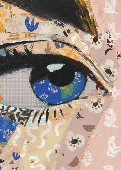 A vibrant mixed-media collage painting focusing on a large human eye. The iris is a deep blue filled with tiny white flower patterns, while the surrounding skin is a patchwork of pink and beige papers with various abstract and floral motifs. The eye is framed by thick black eyeliner. Wall Art