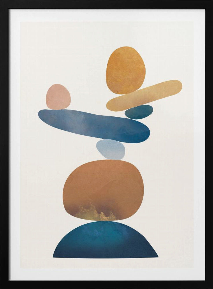 An abstract art print in a thin black frame featuring a stack of colorful, organic shapes resembling balanced stones against a white background. The forms are in various shades of blue, earthy brown, ochre, and a muted pink, creating a sense of calm and equilibrium. Artwork