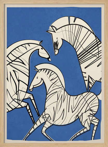 A modern, graphic illustration of three stylized zebras against a bold blue background. The zebras are off-white with thick black outlines and stripes, creating a dynamic and abstract composition. The artwork is presented within a simple black frame. Decor