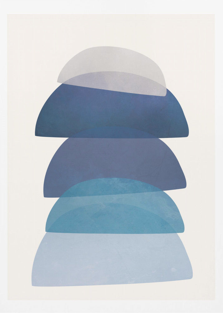 An abstract art print in a black frame, featuring a vertical stack of five semi-circular, dome-like shapes against an off-white background. The shapes are in various shades of blue and gray and have a translucent, overlapping quality, creating a sense of depth and balance. Artwork
