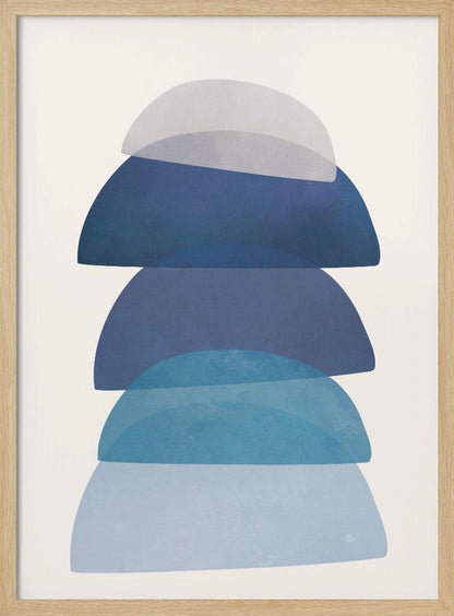 An abstract art print in a black frame, featuring a vertical stack of five semi-circular, dome-like shapes against an off-white background. The shapes are in various shades of blue and gray and have a translucent, overlapping quality, creating a sense of depth and balance. Artwork