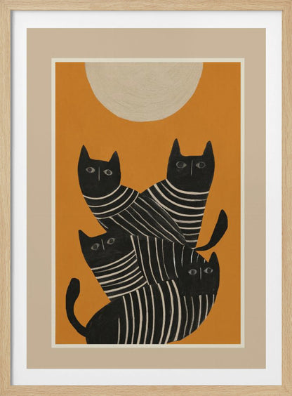 A framed art print of a stylized illustration featuring four black cats with white striped bodies stacked together. They are set against a solid orange background with a large, textured, cream-colored moon or sun at the top. Artwork