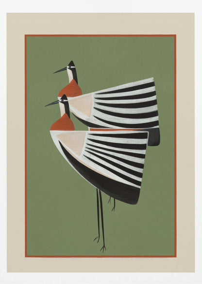 A framed art print featuring two highly stylized birds standing against a solid sage green background. The birds have boat-shaped bodies with bold black and white stripes, orange chests, and long thin black legs and beaks. Wall Art