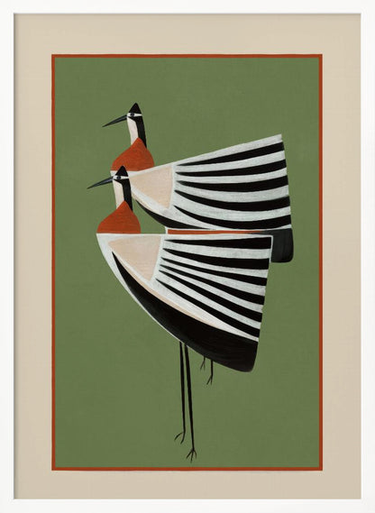 A framed art print featuring two highly stylized birds standing against a solid sage green background. The birds have boat-shaped bodies with bold black and white stripes, orange chests, and long thin black legs and beaks. Wall Art