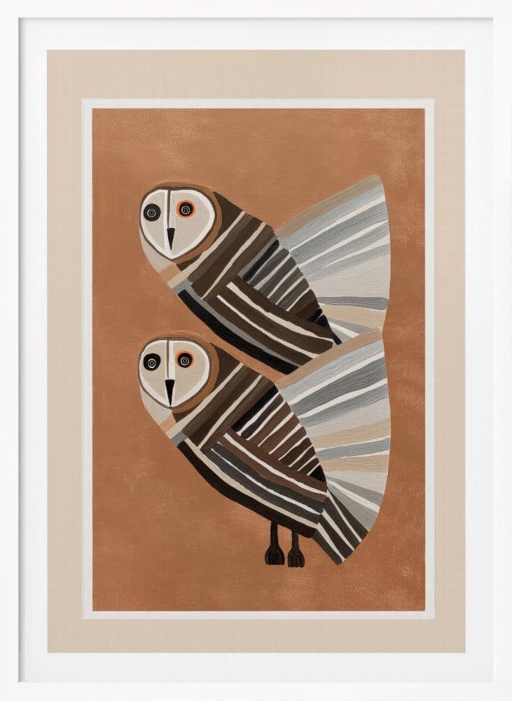 A framed modern art print of two stylized barn owls against a warm brown background. The owls are decorated with geometric stripes in shades of brown, beige, grey, and black, and have large, captivating eyes. Wall Art