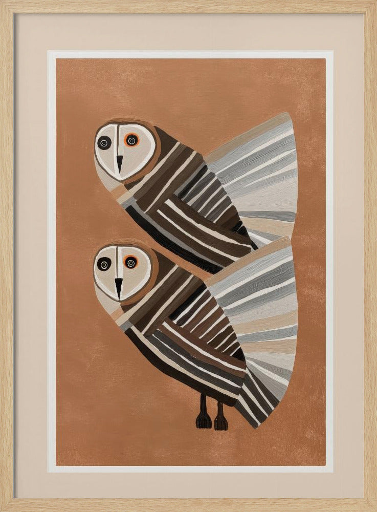 A framed modern art print of two stylized barn owls against a warm brown background. The owls are decorated with geometric stripes in shades of brown, beige, grey, and black, and have large, captivating eyes. Wall Art