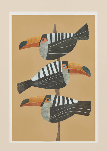 A framed graphic illustration of three stylized toucans perched one above the other on a thin vertical branch. The birds, facing left, have black bodies with bold white vertical stripes, and large, vibrant orange beaks. The background is a solid mustard yellow. Decor