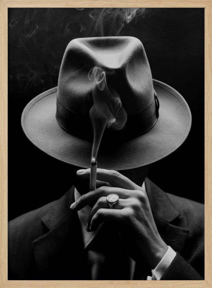 A dramatic black and white portrait of a person in a suit and fedora, their face obscured by the hat's shadow as they hold a lit cigarette with smoke curling upwards. Decor