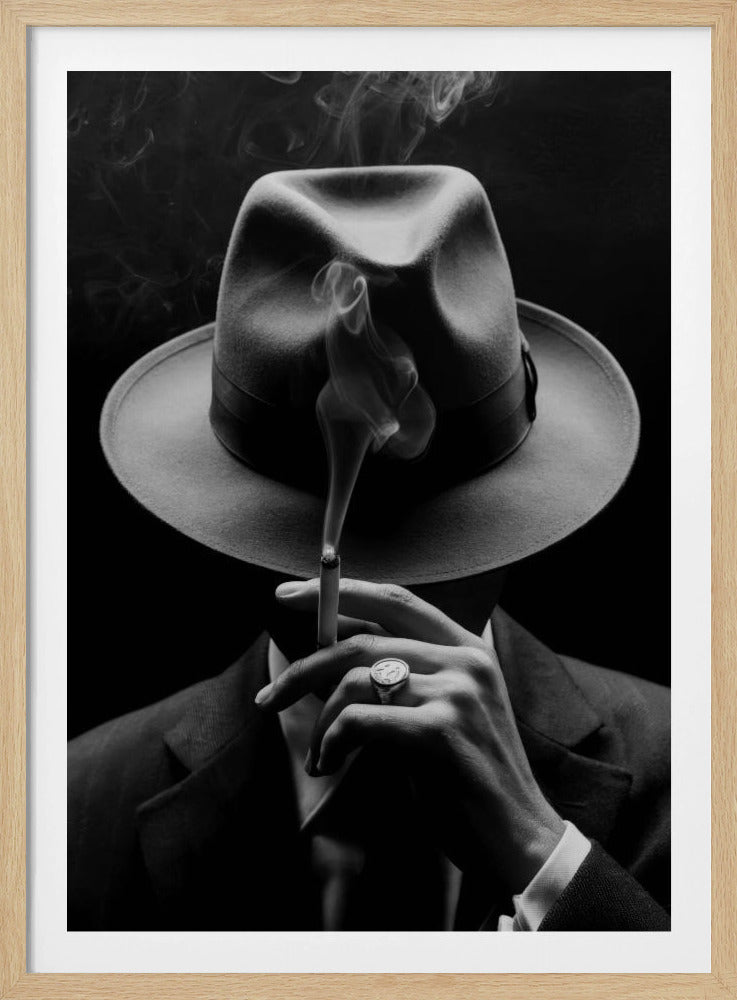 A dramatic black and white portrait of a person in a suit and fedora, their face obscured by the hat's shadow as they hold a lit cigarette with smoke curling upwards. Decor