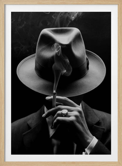 A dramatic black and white portrait of a person in a suit and fedora, their face obscured by the hat's shadow as they hold a lit cigarette with smoke curling upwards. Decor