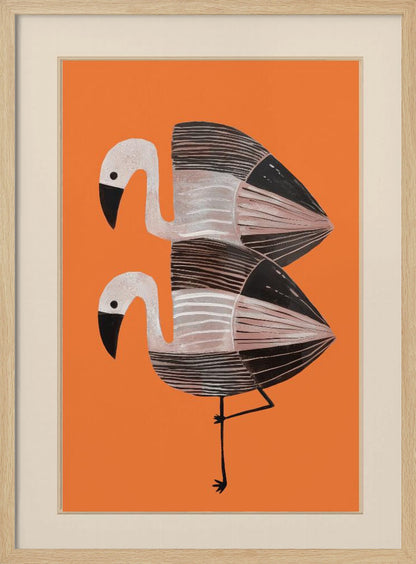 A framed art print of two stylized flamingos against a solid orange background. The birds are stacked vertically, with white heads, black beaks, and bodies featuring black, white, and grey stripes. The lower bird is standing on one leg. Wall Art